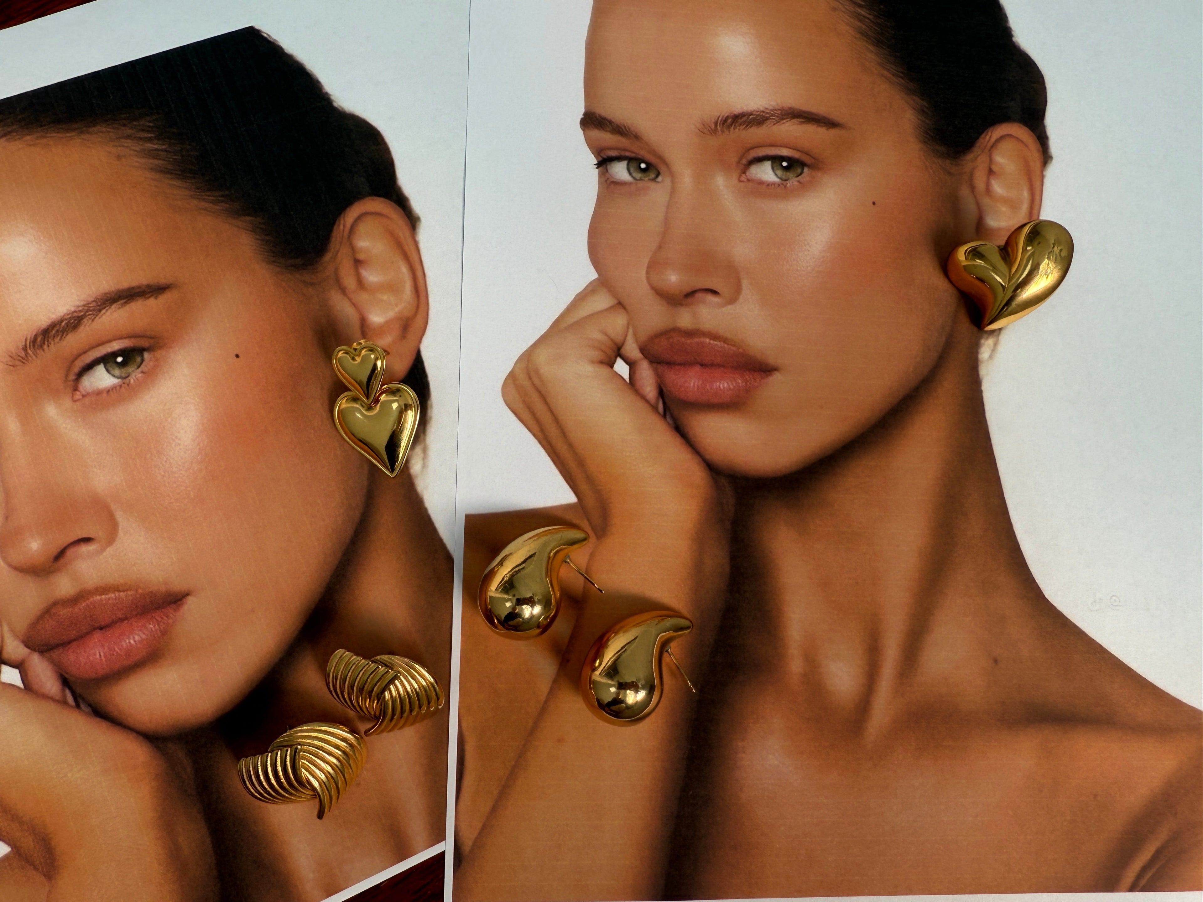 Woman wearing gold earrings with close-up shots on a plain background